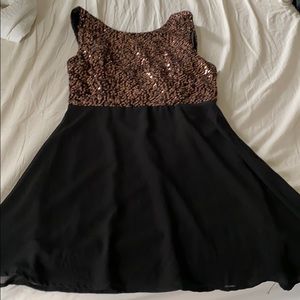 Black gold dress ever worn still has tags